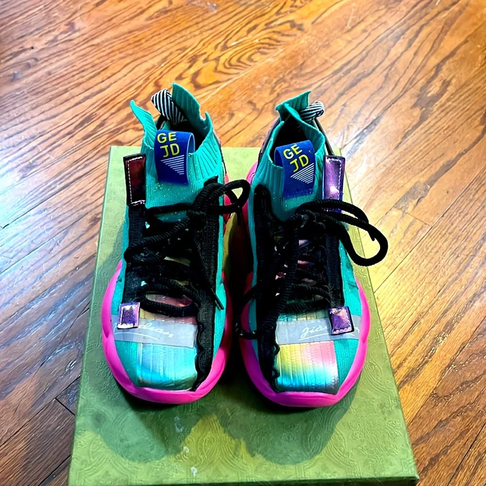 Hello Joy
Pink & Turquoise Sneakers with Black Shoestrings & flowers
Size 40 - Picture 2 of 3